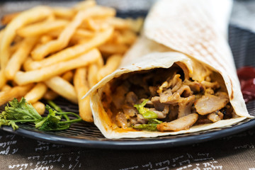 beef tacos served with golden French fries