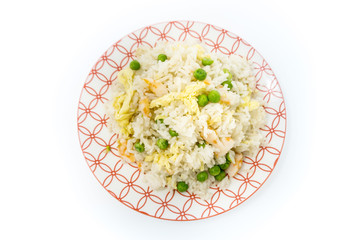 Homemade Chinese fried rice with vegetables and fried eggs