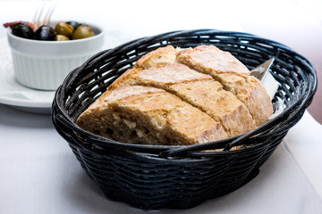 Delicious breakfast bread on table