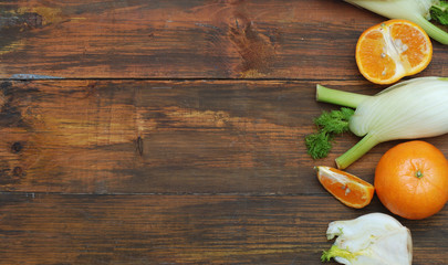 Fennel Vegetable Isolated. Fennel and Orange Citrus Fruit over Wooden Background. Healthy Vegetarian Food.