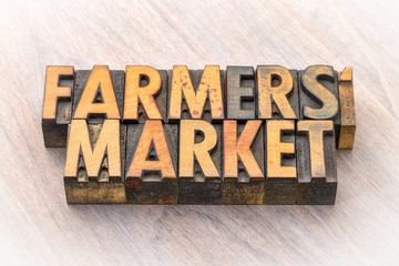 farmers market banner in wood type