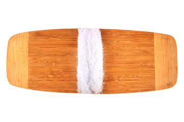 wooden board with a dividing strip of salt
