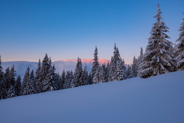 Magic sunrise in the winter mountains