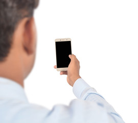 Man holding smartphone with  blank screen professionally isolated on white background