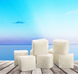 Cubes of sugar on desk