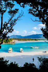 White sand beach crystal clear turquoise water at Kabira Bay, Ishigaki, Okinawa