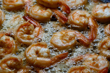 Big orange prawns on a pan