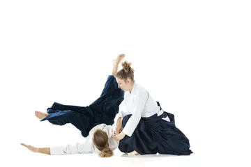 Foto op Plexiglas Man and woman fighting at Aikido training in martial arts school © master1305