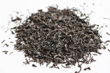 Dry black tea leaves heap