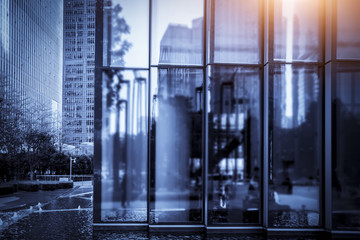 The entrance of the modern Enterprise Building, in the face view of the blue tone.