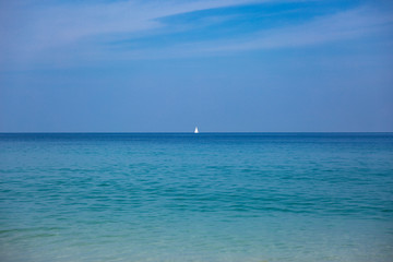 Fototapeta na wymiar Beautiful sky and blue ocean. idyllic background