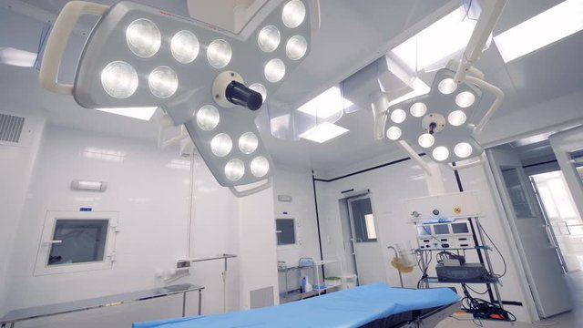 Surgical lamps hanging up in the ceiling. 4K