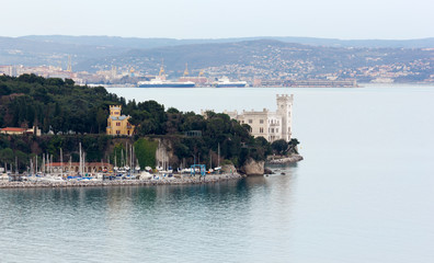 Naklejka premium Miramare Castle near Trieste in a Winter Late Afternoon