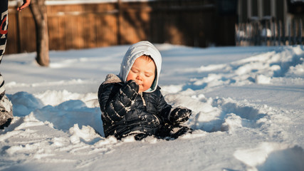 Child Eating Snow