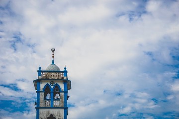 Fototapeta na wymiar blue mosque minaret against the sky
