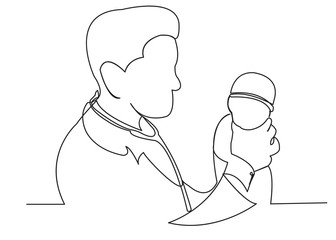 the doctor examines the baby