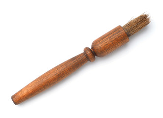 Wooden retro brush on white isolated background