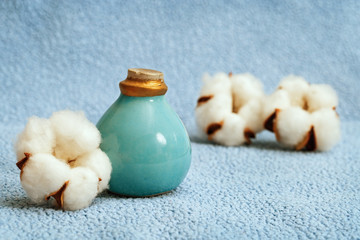 View on spa accessories. Items for bath on soft blue background with copy space. Spa at home. Selective focus.
