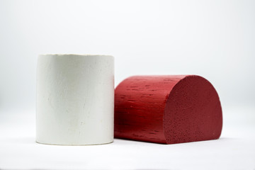 Half circle and circle geometry Made of wood laid on a white background.