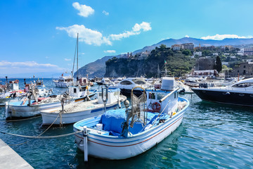 Fototapeta na wymiar Harbor at Vico Equense, center of town Vico Equense in the background. Italy