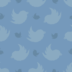Seamless pattern from birds on a on a on a pastel blue background. The Bullfinch Pattern