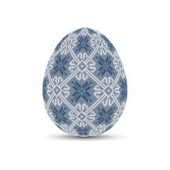 Easter egg with a knitted Scandinavian pattern. Knitted easter egg