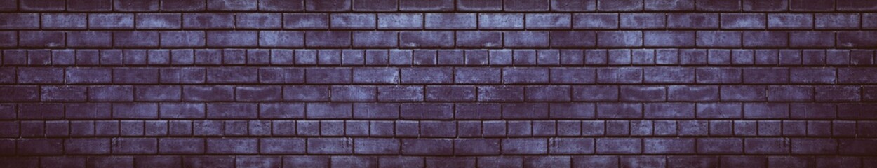 Wide dark violet brick wall gloomy grunge background
