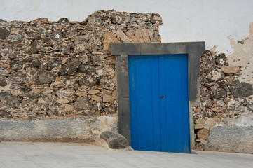 Old Stone Wall and Blue Door 