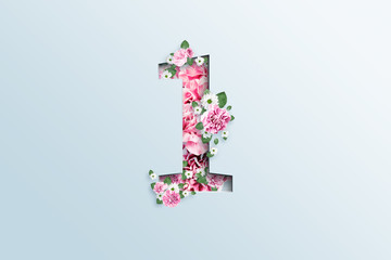 The figure is one consisting of pink flowers and green leaves on a light background. Spring background. flat lay, copy space, Mixed media, top view.