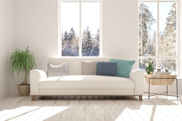 White room with sofa and winter landscape in window. Scandinavian interior design. 3D illustration