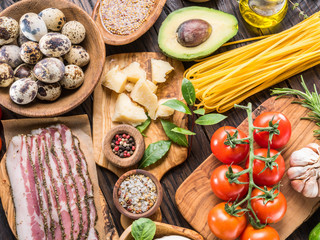 Variety of popular Italian food on wooden background. Top view.