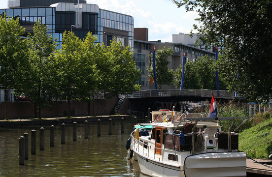 Boats mooring in river Vecht and the little sluice, called Weerd sluis