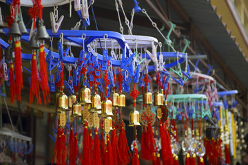Wind chimes with writings from unknown language (non-english) on them