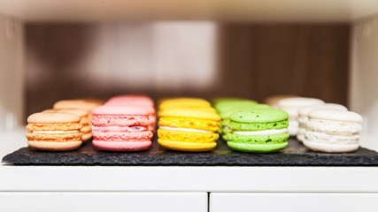 Set of french multicolored macaroons close up