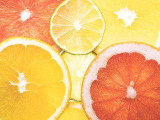 Abstract background of citrus slices. Close-up. Studio photography.