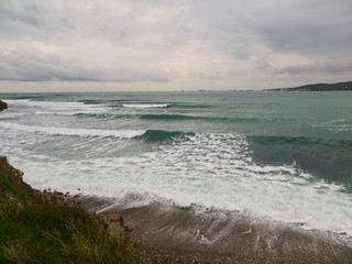View of the waves and foam in the Black Sea. Gelendzhik, Russia