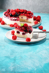 raspberry cake and many fresh raspberries