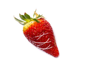 A broken strawberry sewn. The concept of healthy food. Strawberries fruits