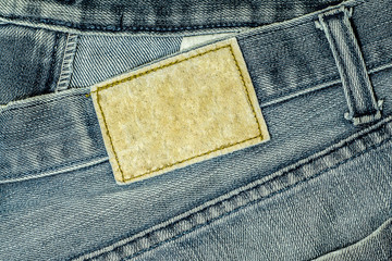 old label jeans Texture of old denim or blue jeans background