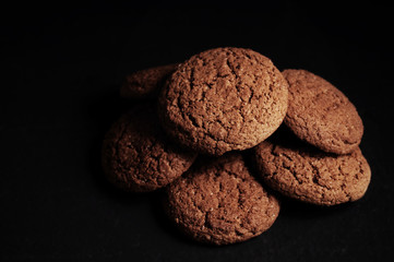 oatmeal cookies on a black table