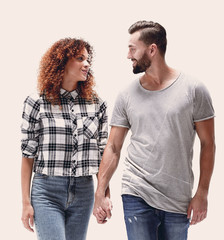 Fototapeta premium young people holding hands and walking forward.