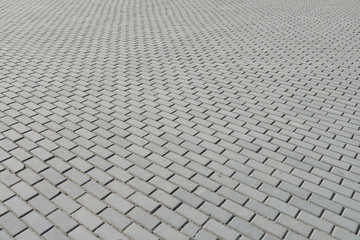 Fototapeta premium Old cobblestone pavement close-up.