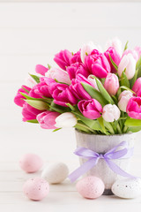 Naklejka na ściany i meble Pink tulip on the white background. Easter background