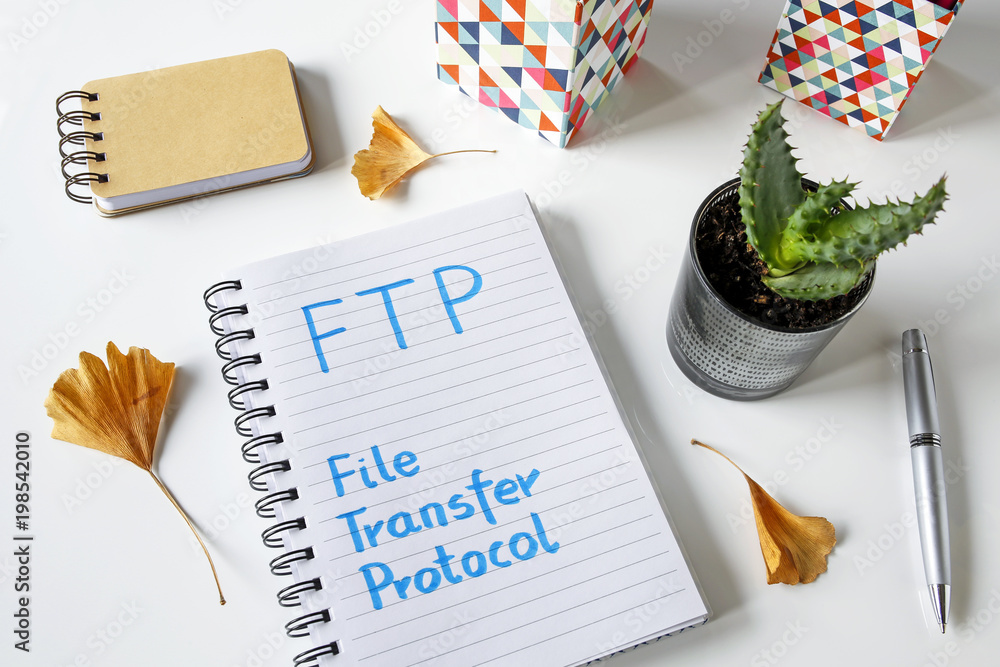 Poster ftp, file transfer protocol written in a notebook on white table