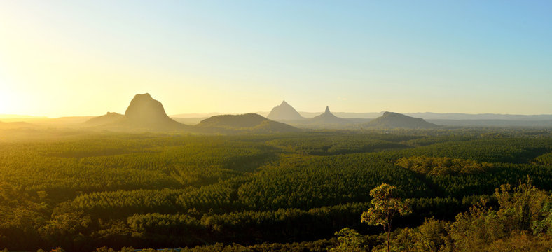 Panoramic view of Glass House Mountains at sunset in Queensland, Australia.