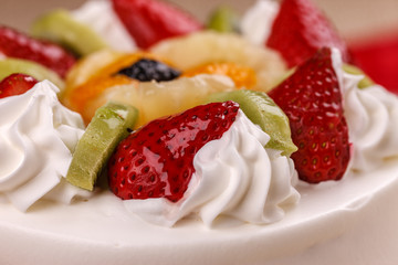 Macro of fruit on cake.