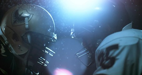 American football players in stadium during game - Powered by Adobe