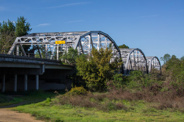 Metal bridge over rural land