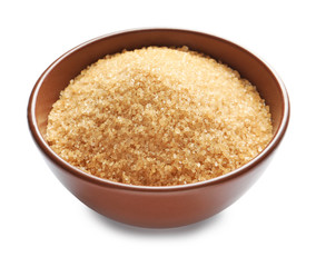 Bowl with brown sugar on white background