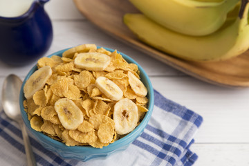 Breakfast Cereal and Bananas in a Blue Bowl
